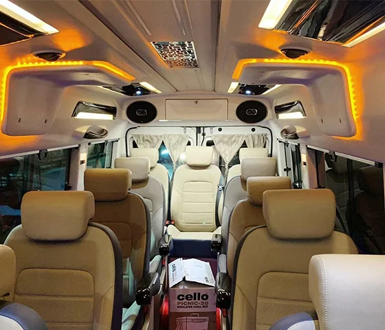 Experience Comfort and Luxury with a 12-Seater Tempo Traveller on Rent in Delhi